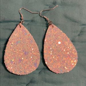 Iridescent glittery earrings.